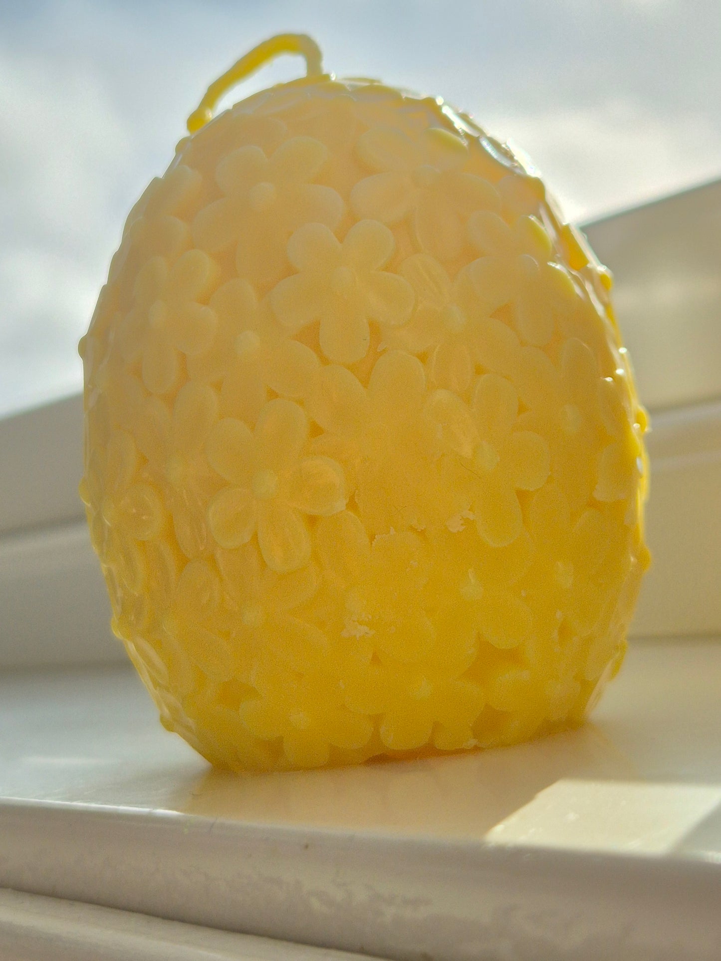 Handmade Egg-Shaped Candle with Floral Design